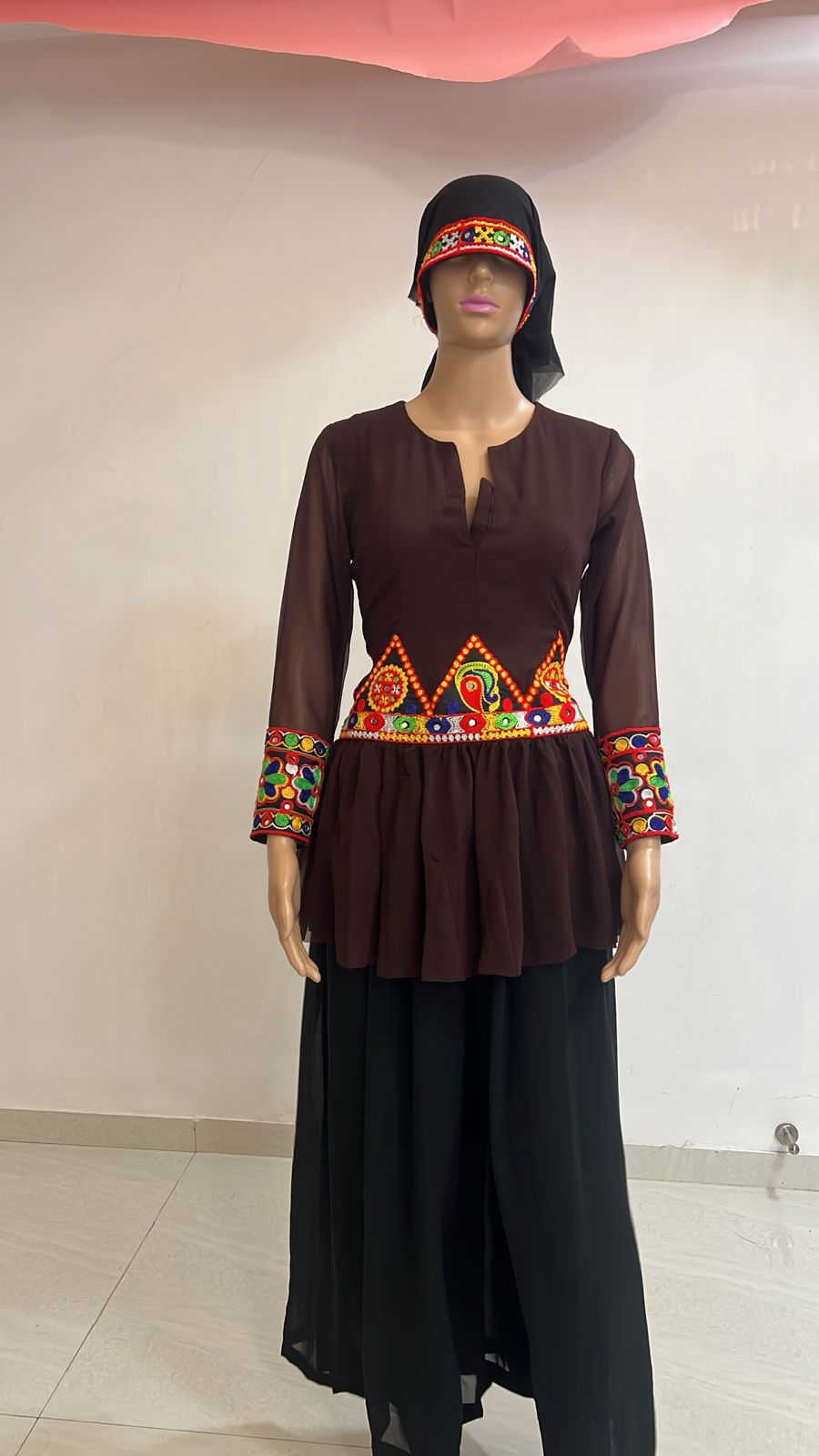 Rich chocolate-brown peplum kurta (Only Kurta)